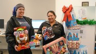 VRC Staff Holding Holiday Gifts